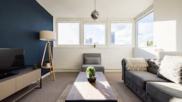 Apartment | Living area | 37-inch Smart TV with satellite channels, Netflix, streaming services