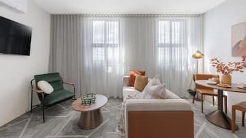 One Bedroom Apartment | Living area | 50-inch Smart TV with satellite channels, Netflix, streaming services