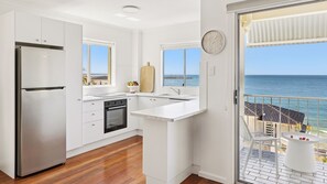 Microwave, dining tables - Boorolong 1 -  Ocean Views  - Holiday Yamba (Yamba)