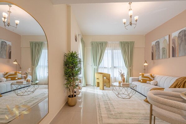 Elite Apartment | Living area | 55-inch Smart TV with cable channels - Marco Polo - May Residence 2 (Dubai)