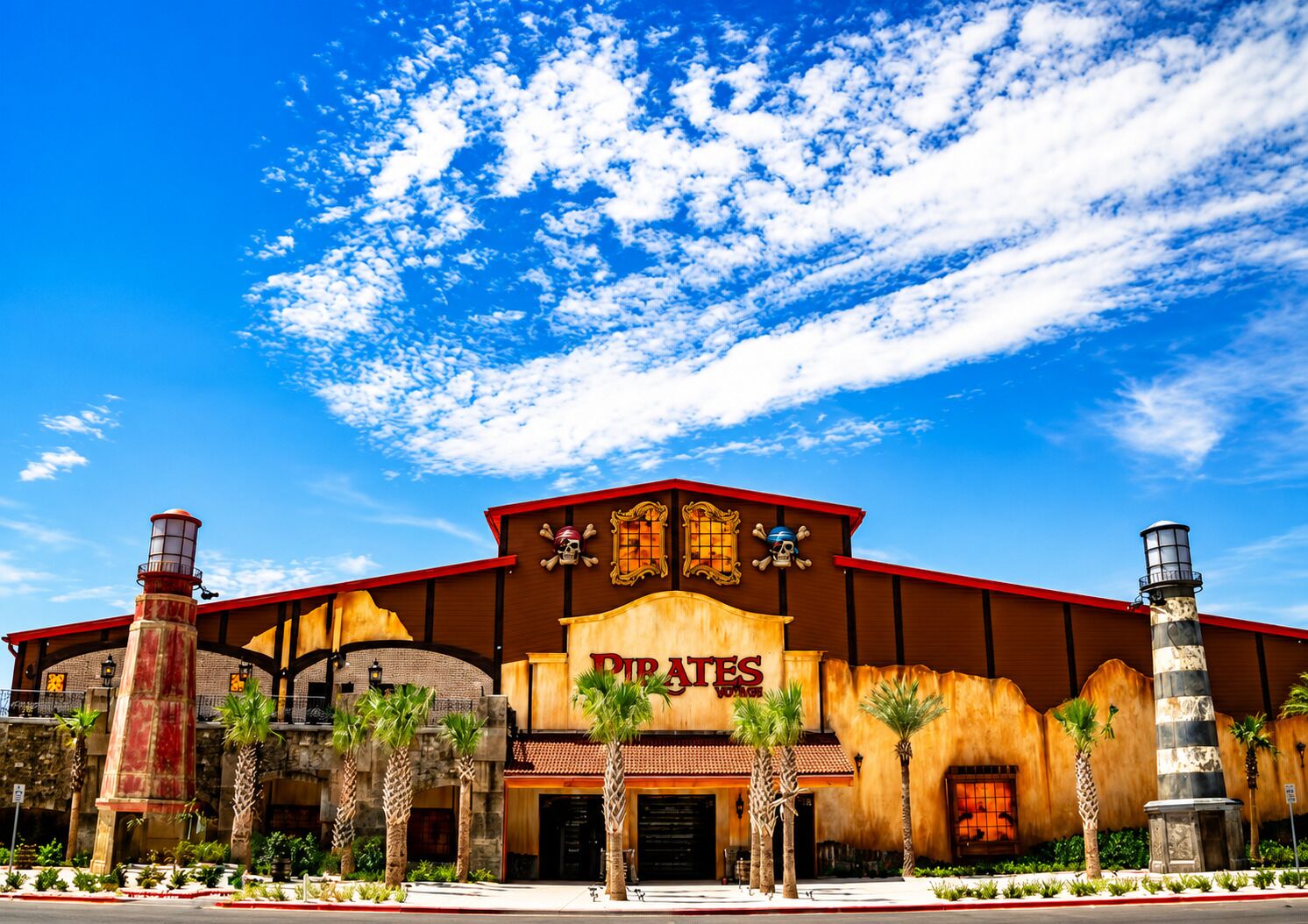 A building with a sign reading 'Pirates' and a large, ornate entrance.