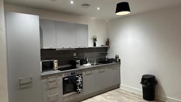 Apartment | Private kitchen | Fridge, microwave, oven, stovetop