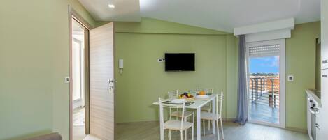 Family Apartment, 1 Bedroom, Balcony, Sea Facing (Casa Golf a 200m From The Sea) | Living area | Smart TV