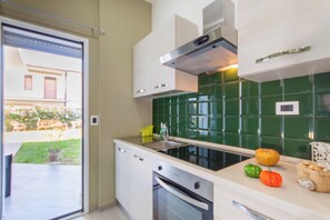 Family Apartment, 1 Bedroom, Balcony, Sea Facing (Casa Smeralda a 200m From The Sea) | Private kitchen | Fridge, oven, stovetop, cookware/dishes/utensils - Casa Smeralda a 200m From The Sea (Augusta)