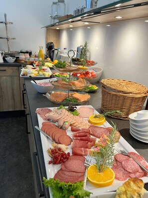 Daily buffet breakfast (EUR 14 per person)