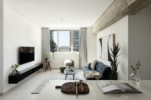 One Bedroom Superior Apartment with City or Sea View | Living area | TV - Mr. Rothschild by TLV2GO (Tel Aviv)
