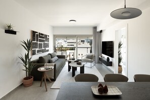 Premium Apartment, 2 Bedrooms, City View | Living area | TV - Mr. Rothschild by TLV2GO (Tel Aviv)