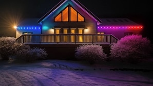 A house with a gabled roof, a front porch, and a snow-covered driveway. - Cabin w/ Hot Tub and Wifi: 4 Mi to Snowshoe Resort (Cass)