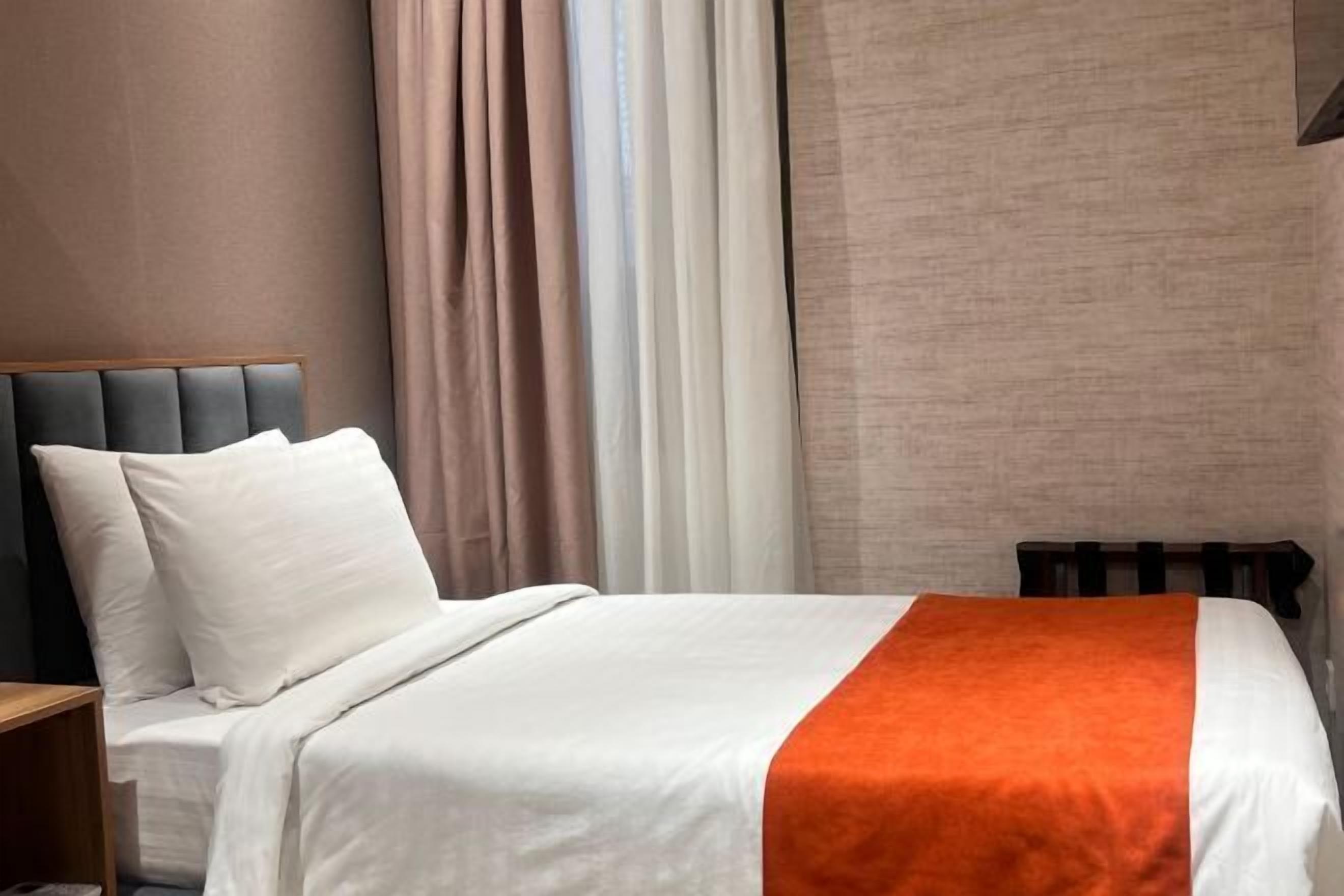 Minibar, safe på rommet, individuelt innredet og blendingsgardiner