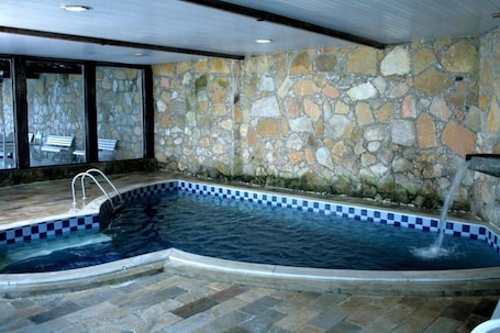 Indoor pool, outdoor pool, pool umbrellas