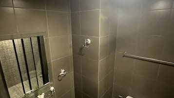 Shower, hair dryer, towels, toilet paper