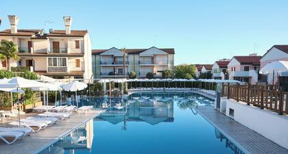 Wohnung in einer Residenz mit Pool in Rosolina