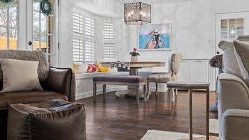 Smart TV, fireplace, books, offices