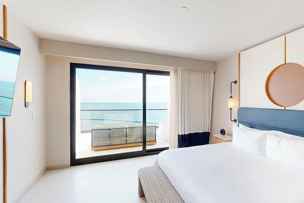 Room, Oceanfront (Couples) | Free minibar, in-room safe, desk, blackout drapes
