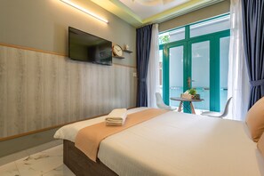 Deluxe Studio Suite | Premium bedding, free minibar, desk, blackout drapes - Cô Châu Homestay (Ho Chi Minh City)