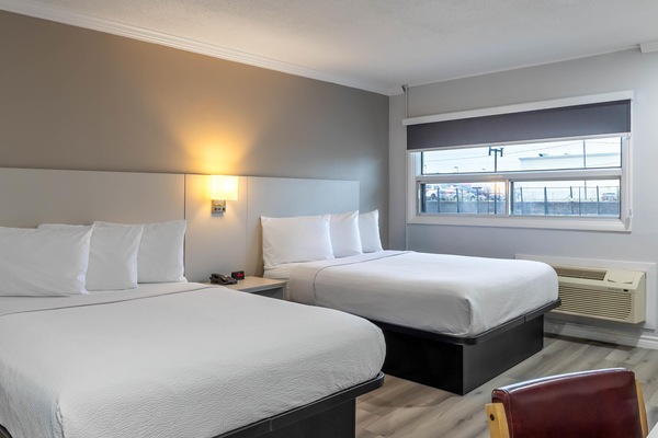 Deluxe Room, 2 Queen Beds, Non Smoking, Refrigerator & Microwave | Blackout drapes, soundproofing, iron/ironing board, free WiFi