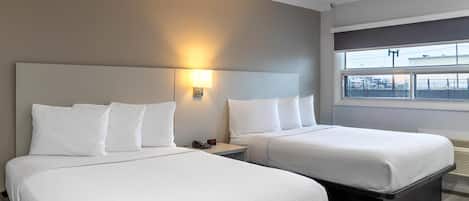 Deluxe Room, 2 Queen Beds, Non Smoking, Refrigerator & Microwave | 1 bedroom, blackout curtains, soundproofing, iron/ironing board