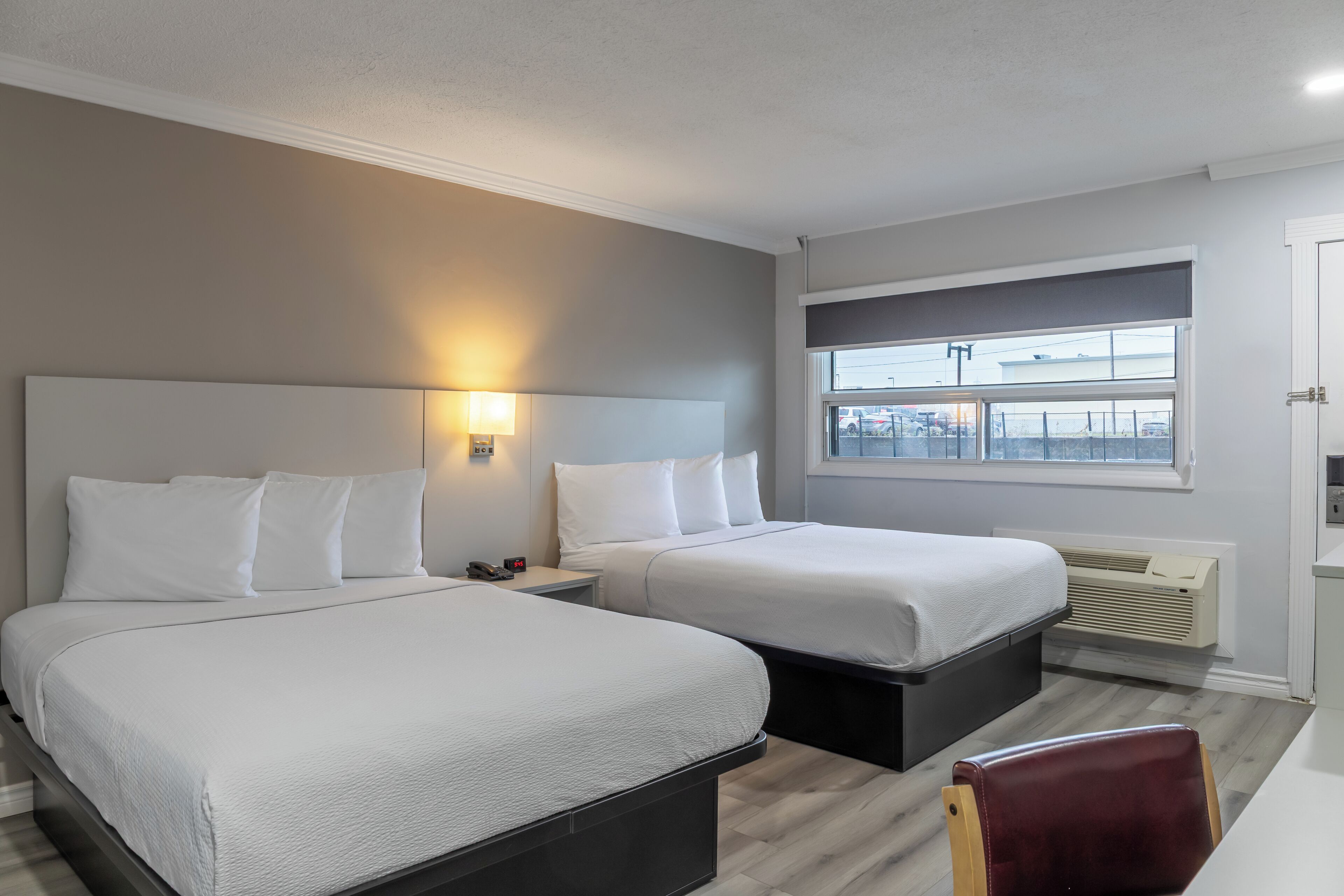 Deluxe Room, 2 Queen Beds, Non Smoking, Refrigerator & Microwave | Blackout drapes, soundproofing, iron/ironing board, free WiFi