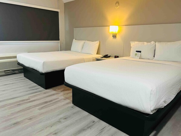 Deluxe Room, 2 Queen Beds, Non Smoking, Refrigerator & Microwave | 1 bedroom, blackout drapes, soundproofing, iron/ironing board