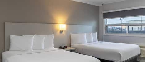 Deluxe Room, 2 Queen Beds, Non Smoking, Refrigerator & Microwave | Blackout drapes, soundproofing, iron/ironing board, free WiFi