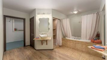 Jetted bath, hair dryer, towels, soap