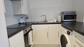 Apartment | Private kitchen | Fridge, microwave, oven, stovetop