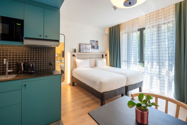 Studio, 2 Twin Beds | In-room safe, desk, laptop workspace, blackout drapes
