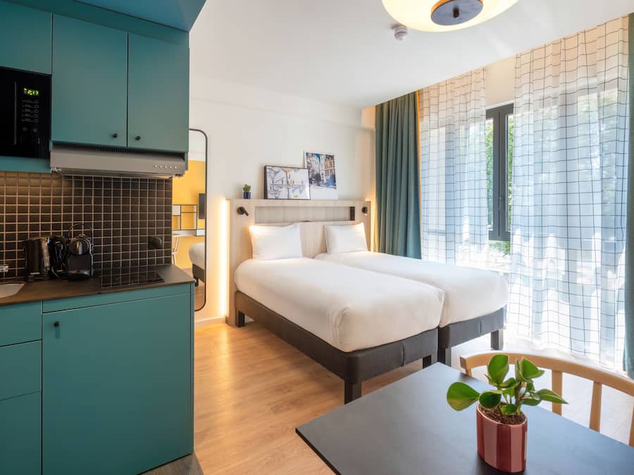 Studio, 2 Twin Beds | In-room safe, individually furnished, desk, laptop workspace