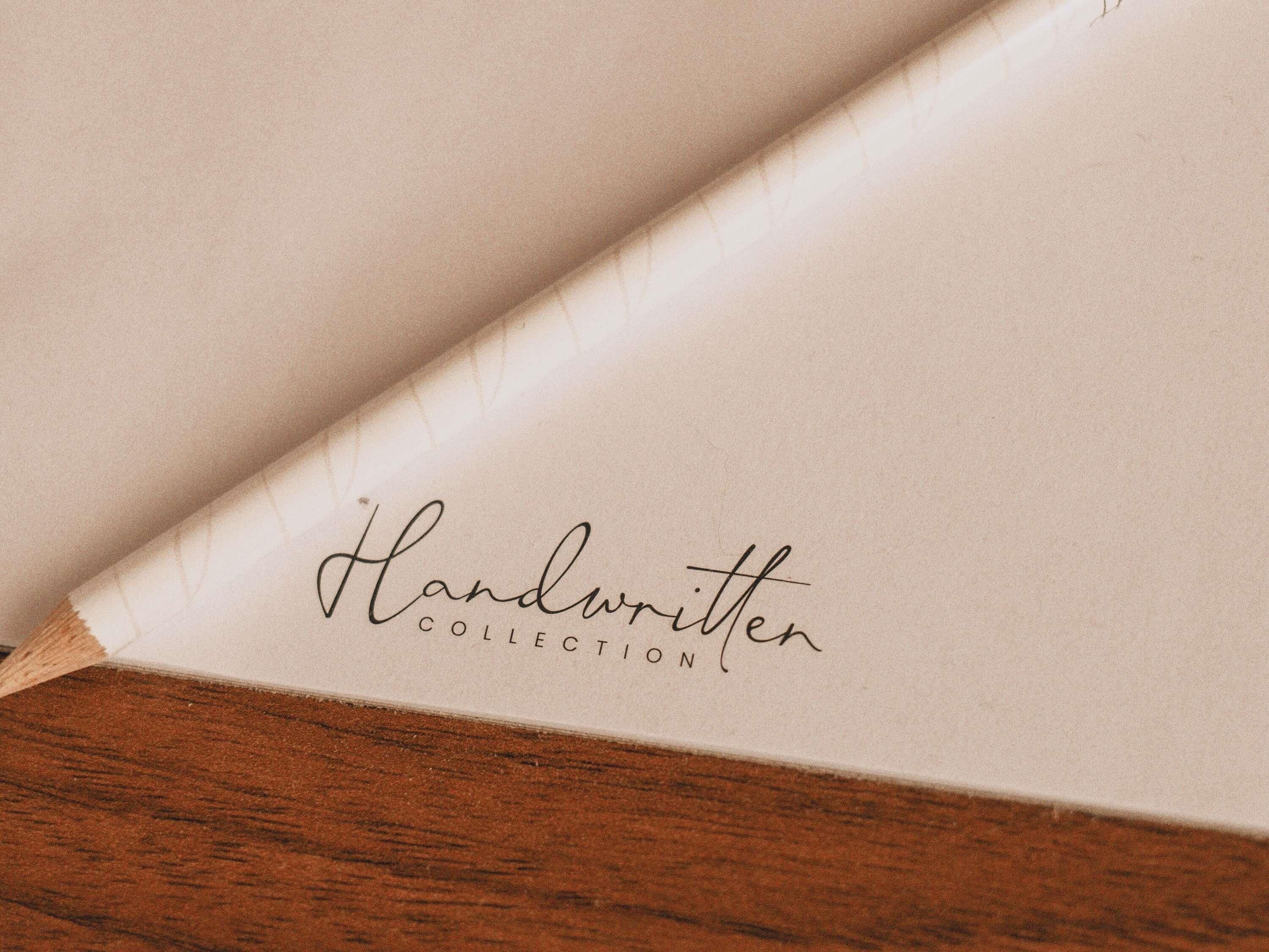 A piece of paper with the words 'Handwritten Collection' written on it.