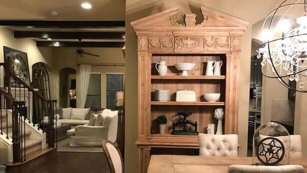 A dining area with a wooden table and chairs, a decorative cabinet with kitchenware, and a staircase leading to another level.