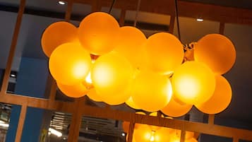 A chandelier with multiple spherical light fixtures.