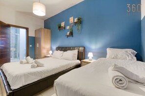 3 bedrooms, desk, iron/ironing board, travel cot