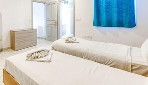 2 bedrooms, desk, iron/ironing board, travel crib