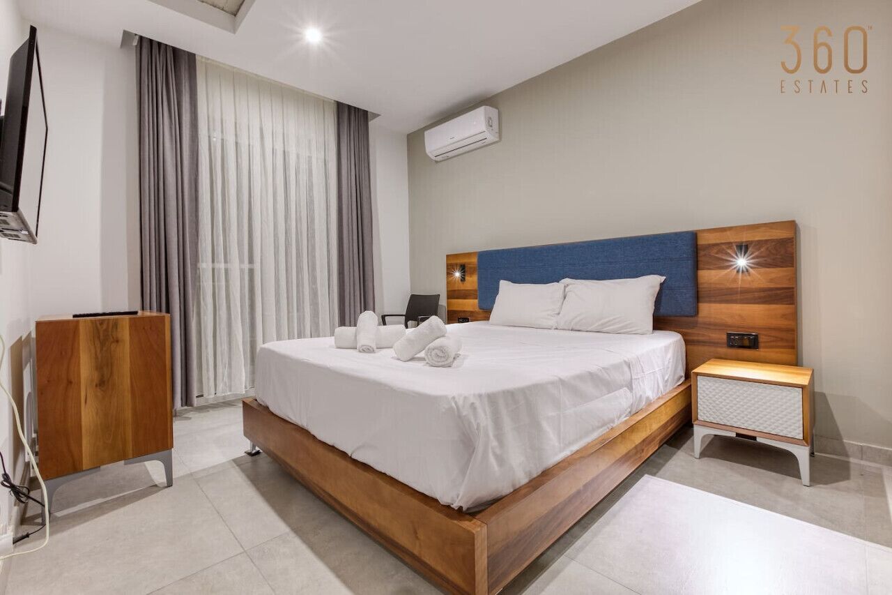 1 bedroom, desk, iron/ironing board, travel crib