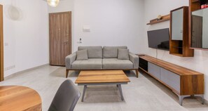 TV - Modern Swieqi 1BR home with Pool Access (Is-Swieqi)