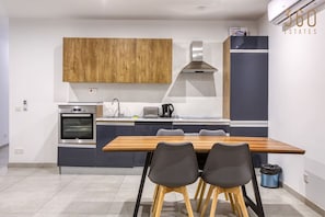 Fridge, oven, stovetop, dishwasher - Stylish Swieqi 2BR Apt with Pool Access, Wifi & AC (Is-Swieqi)