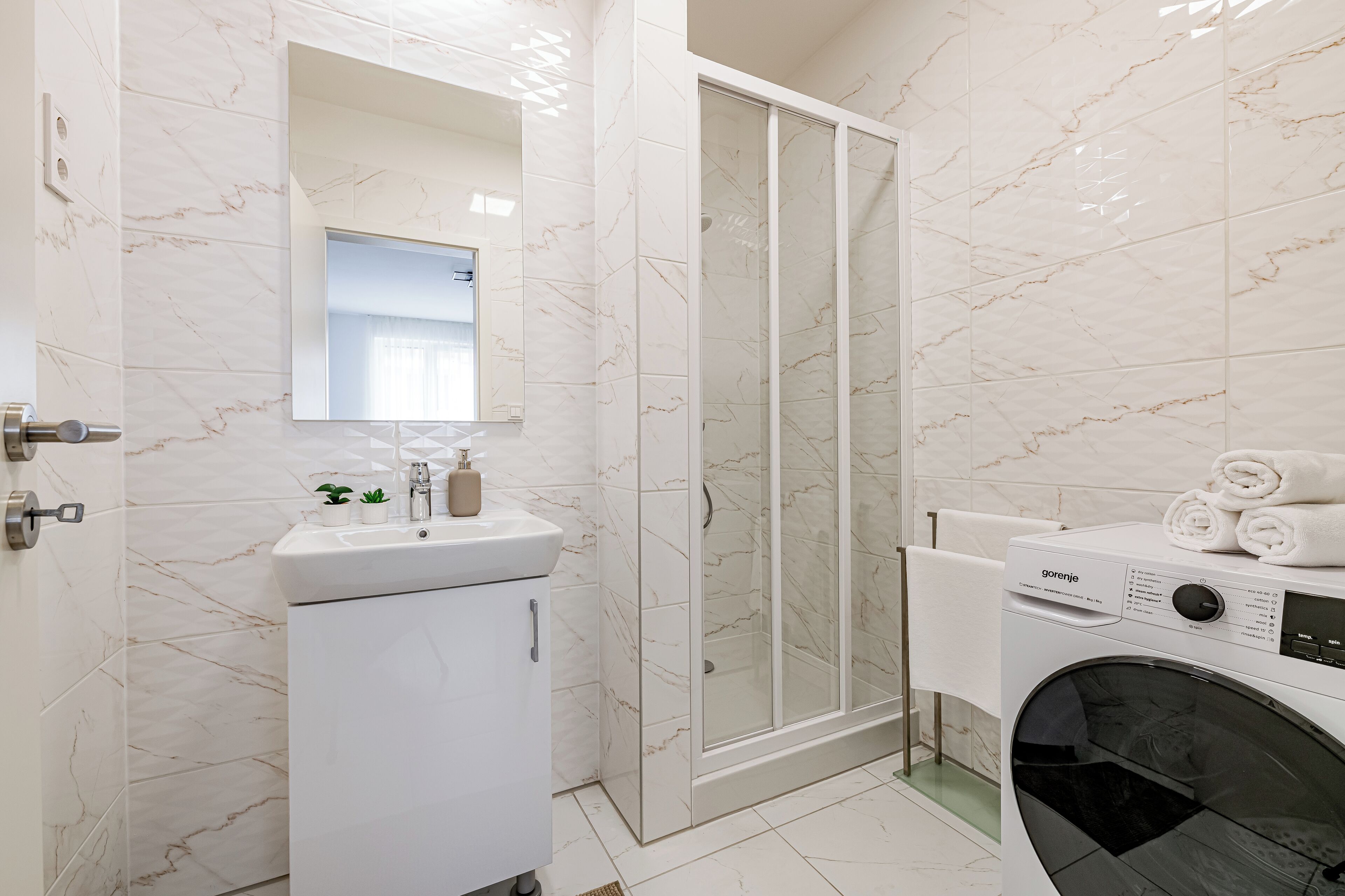 Spirit Residence Family Apartment | Bathroom | Hair dryer, towels, soap, shampoo