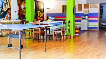 Family Apartment | Living area | 52-inch plasma TV with cable channels, DVD player, toys