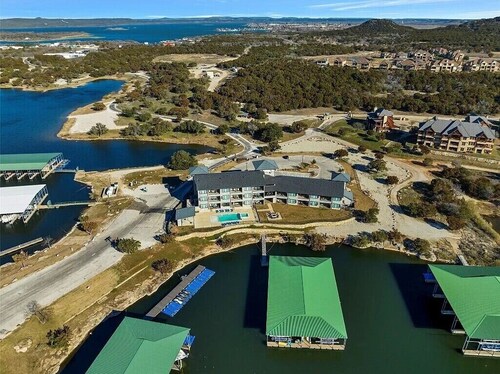 NEW! First Floor Pool side PK Lake Luxury Condo - Hot Tub, FirePit, Gym, Laundry