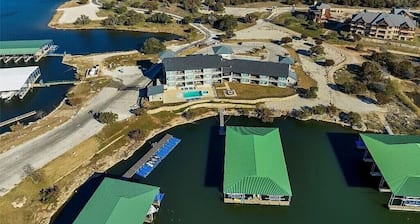 NEW! First Floor Pool side PK Lake Luxury Condo - Hot Tub, FirePit, Gym, Laundry