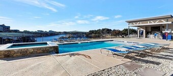 NEW! First Floor Pool side PK Lake Luxury Condo - Hot Tub, FirePit, Gym, Laundry