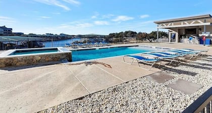 NEW! First Floor Pool side PK Lake Luxury Condo - Hot Tub, FirePit, Gym, Laundry