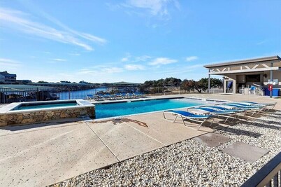 NEW! First Floor Pool side PK Lake Luxury Condo - Hot Tub, FirePit, Gym, Laundry