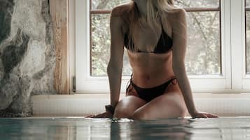 Indoor pool, open 7:00 AM to 8:00 PM, pool loungers