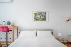 1 bedroom, desk, iron/ironing board, travel crib
