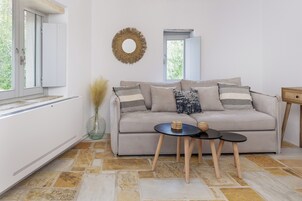 Apartamento luxo | Área de estar | TV de tela plana