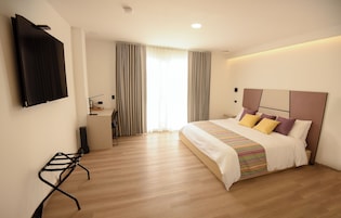 Quarto elite | Cofres nos quartos, cortinas blackout, quartos à prova de som