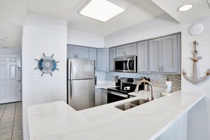 Fridge, microwave, oven, stovetop - Silver Beach 204 | Clean, Comfy, Beach Front, Pool, Pet Friendly! (Orange Beach)