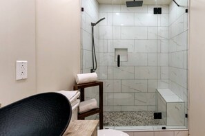 Shower, eco-friendly toiletries, hair dryer, towels