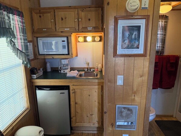 Microwave, coffee/tea maker, toaster, cookware/dishes/utensils